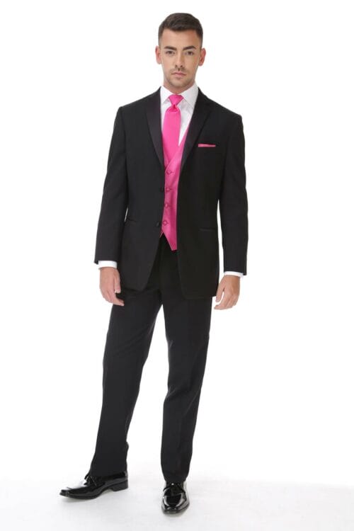 A man in an After Six Roma tuxedo rental with a pink tie.