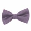 A purple bow tie on a white background, perfect for suit rental.