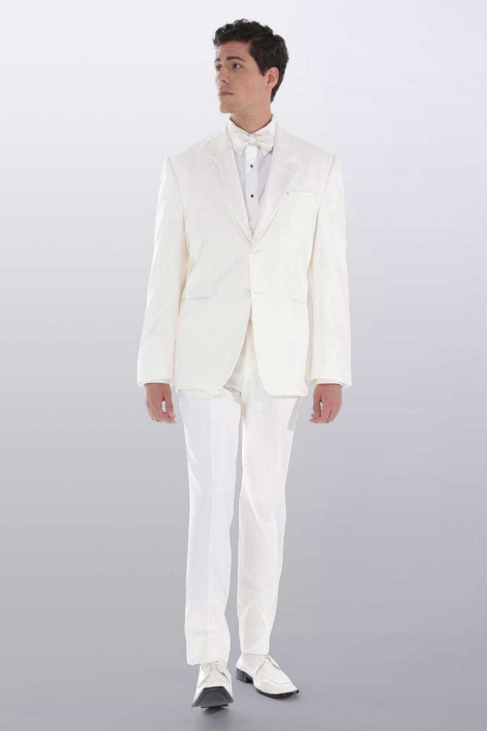 A man in a white tuxedo standing in front of a white background, showcasing the After Six Gerard tuxedo rental option.