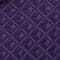 A close up of a purple fabric with a diamond pattern, perfect for suit or tuxedo rentals.