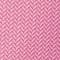 A close up of a pink herringbone pattern, suitable for suit rental.