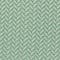 An image of a green herringbone fabric, suitable for suit rental.
