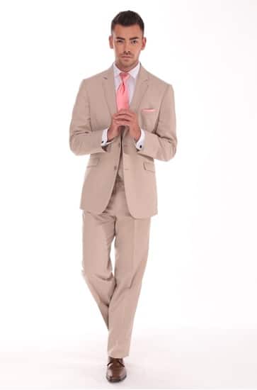 A man wearing a Jean Yves Tan Moda suit for a tuxedo rental.