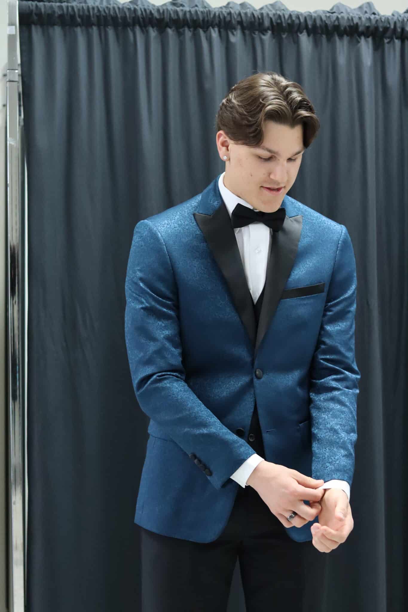 A young man in a Paisley Slim Fit Tuxedo rental.